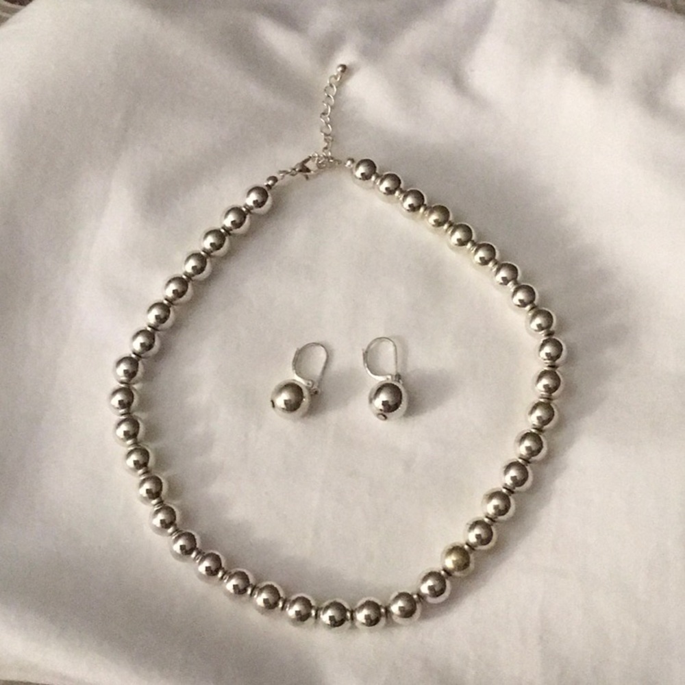 Silver  necklace and matching earrings